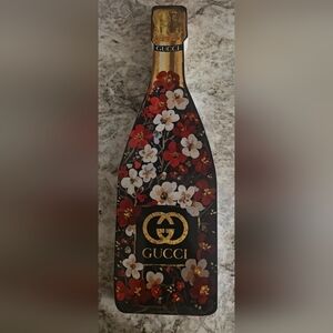 Gucci Black Bottle with Red and White Floral Design